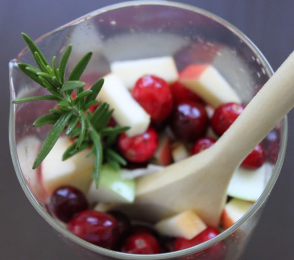 Making Rosemary Cranberry White Sangria